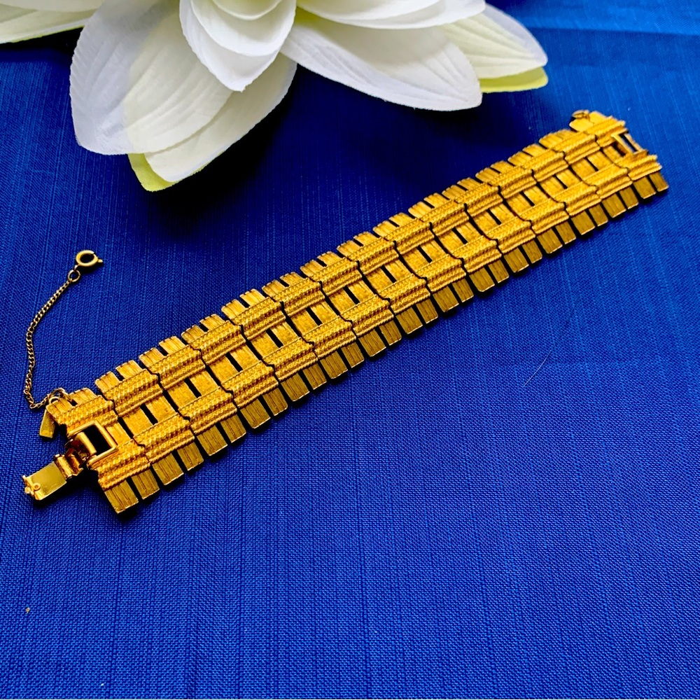Vintage Monet Bold Dramatic Gold-tone Bracelet.